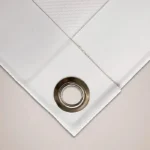Anniversary Backdrops: Close up of a PVC banner hem and metal eyelet